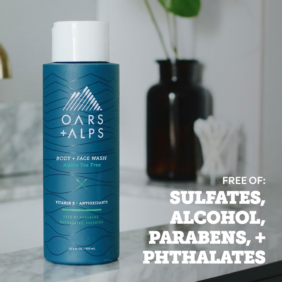 Oars + Alps in-shower use on a man's hand demonstrating cleansing action