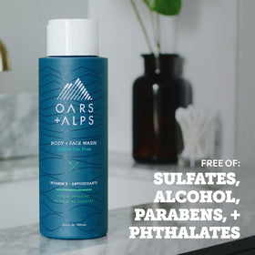 Oars + Alps in-shower use on a man's hand demonstrating cleansing action