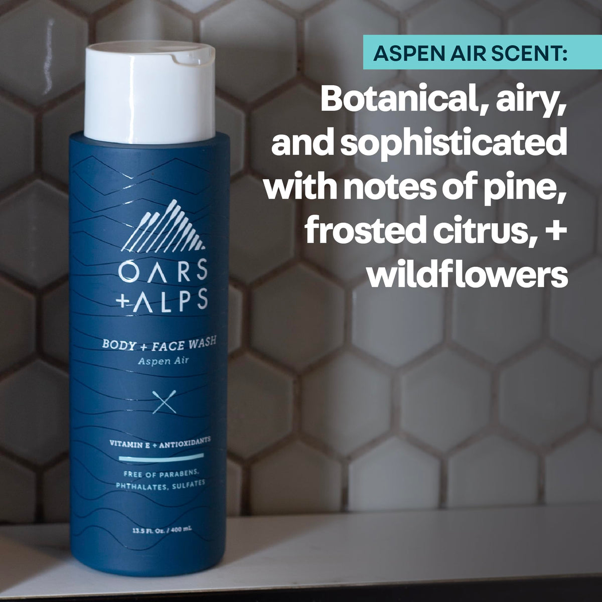 Oars + Alps bottle styled on bathroom shelf suggesting clean routine and scent