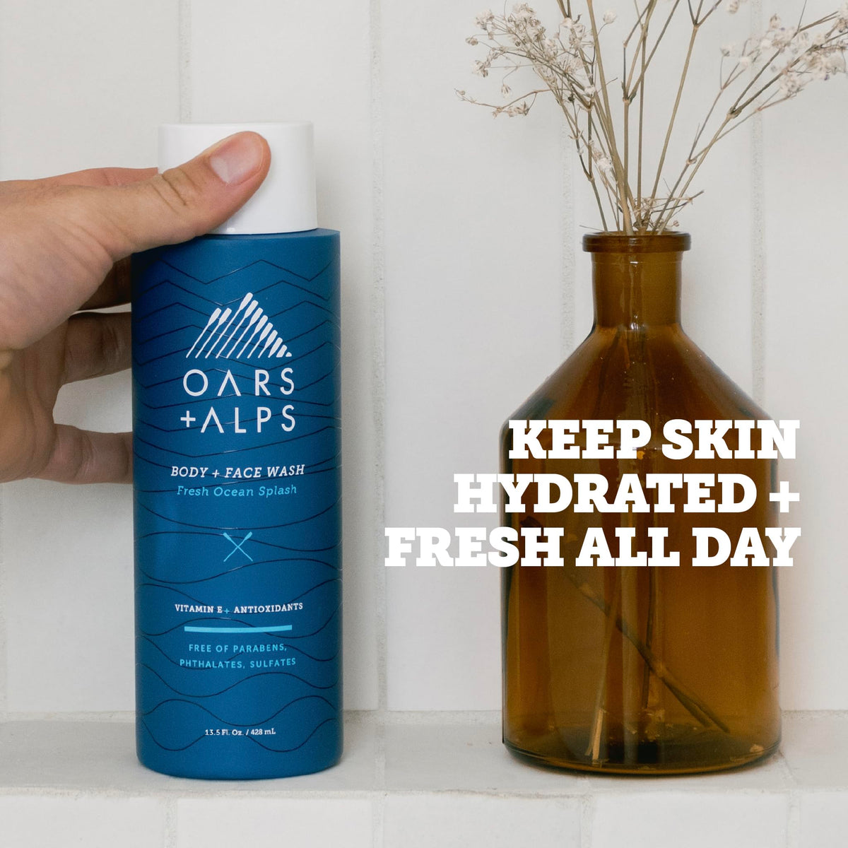 Oars + Alps pump and label detail highlighting active ingredients and scent