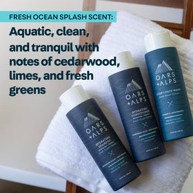 Oars + Alps bottles held in hand for size comparison and travel-ready convenience benefit
