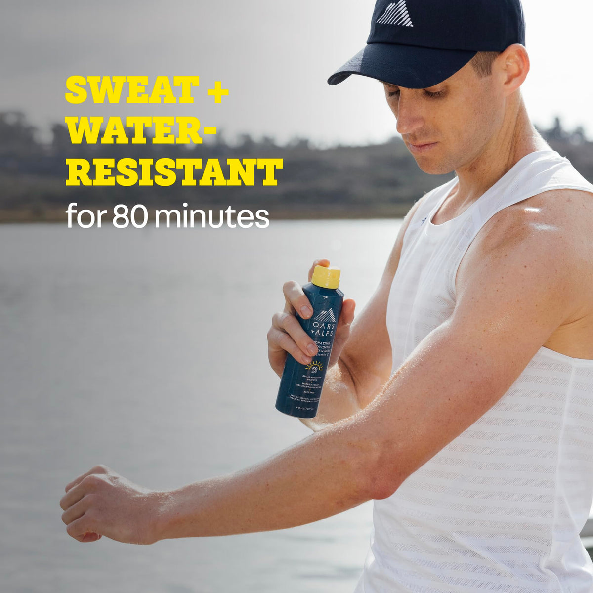 Oars + Alps can in hand to show 6 oz size and portability benefit