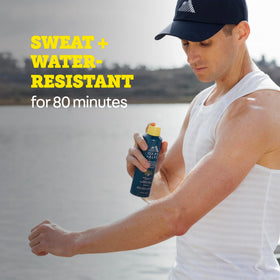 Oars + Alps can in hand to show 6 oz size and portability benefit