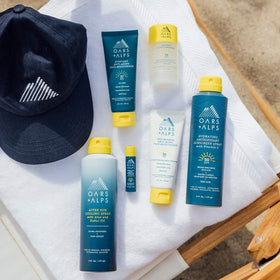 Oars + Alps stick inside a beach backpack for on-the-go sun care