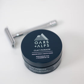 Oars + Alps jar on bathroom counter showing everyday grooming use