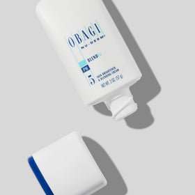 Obagi Medical close shot of cream texture emphasizing arbutin-rich formula for gentle brightening benefit