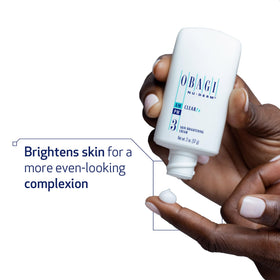 Obagi Nu-Derm open jar texture showing smooth cream for easy absorption