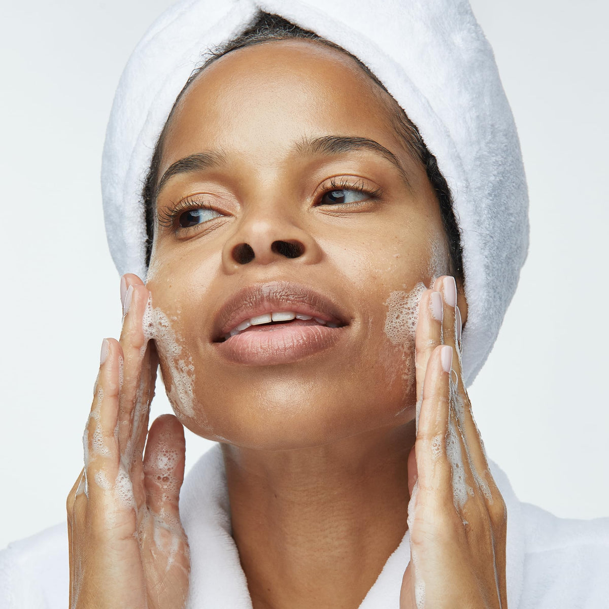 Obagi Medical bottle on sink emphasizing daily cleansing routine benefits
