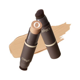 OBgE front packaging of foundation stick showing shade and compact benefit