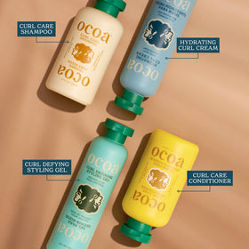 OCOA bottle on bathroom shelf styled among towels showing everyday routine compatibility