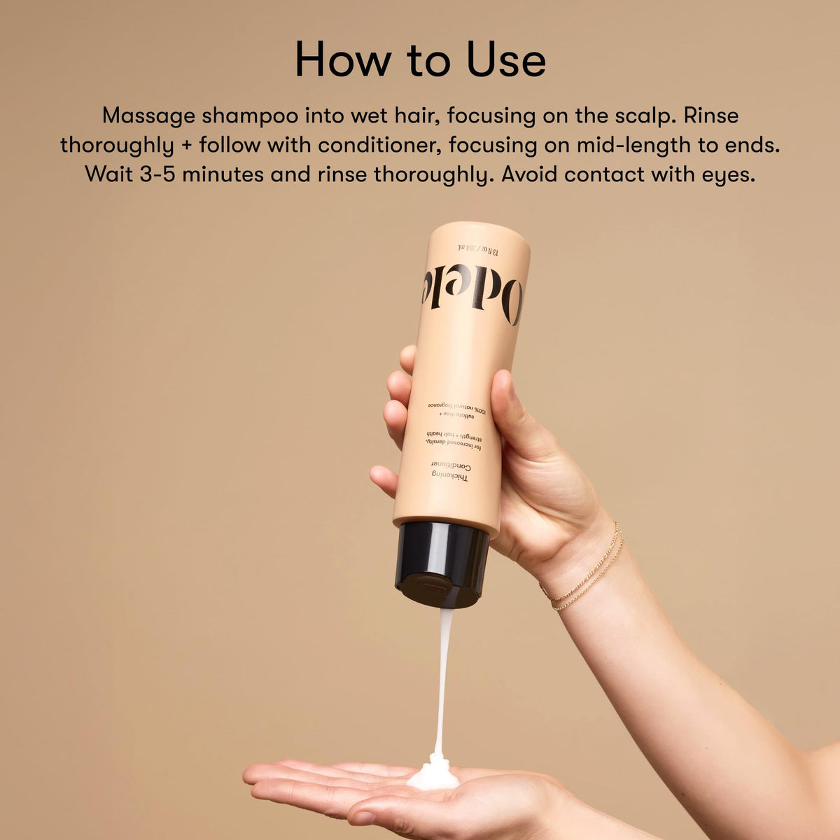 Odele set in hand size comparison illustrating travel-friendly 13 fl oz bottles