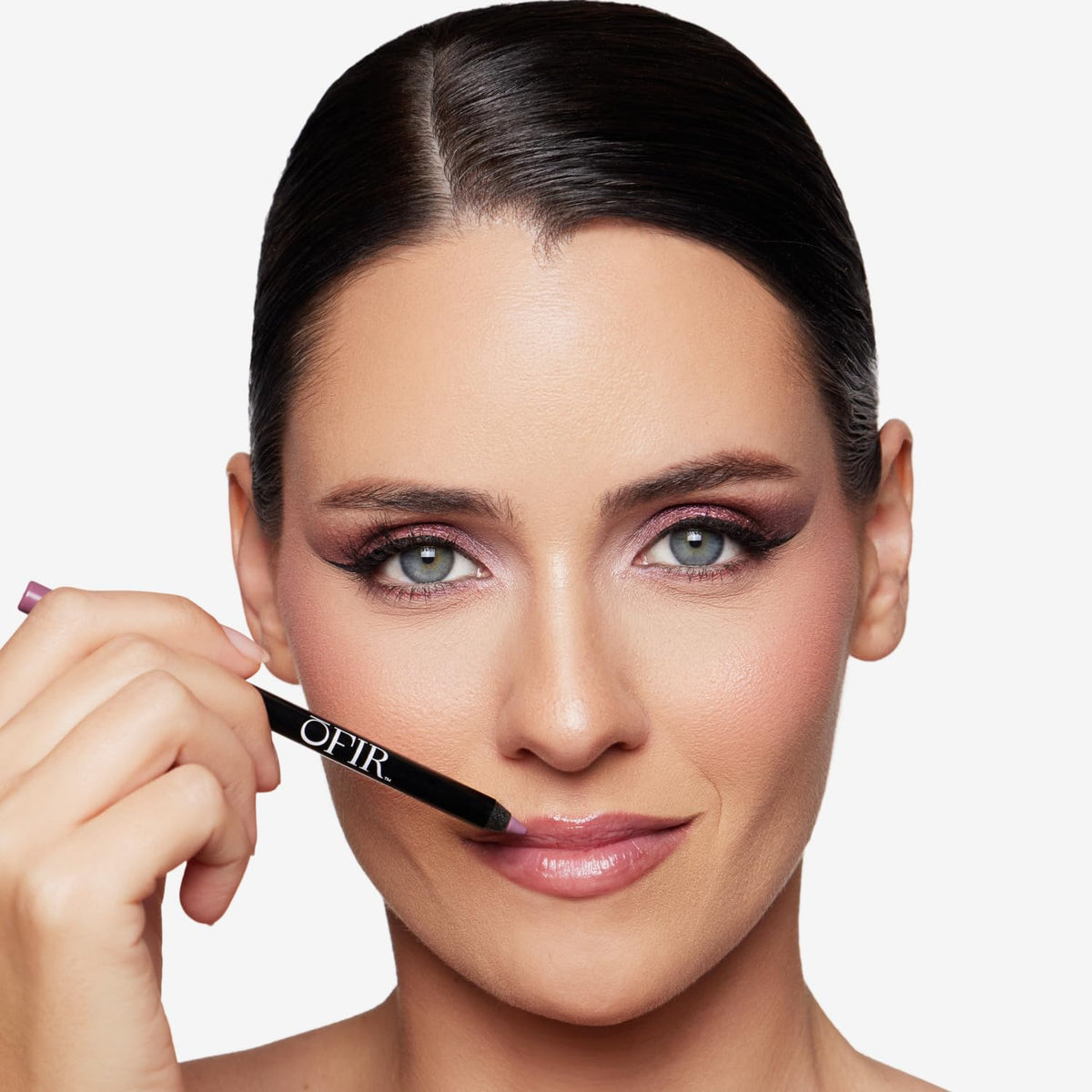 OFIR paired with gloss in lifestyle shot showing versatile layering