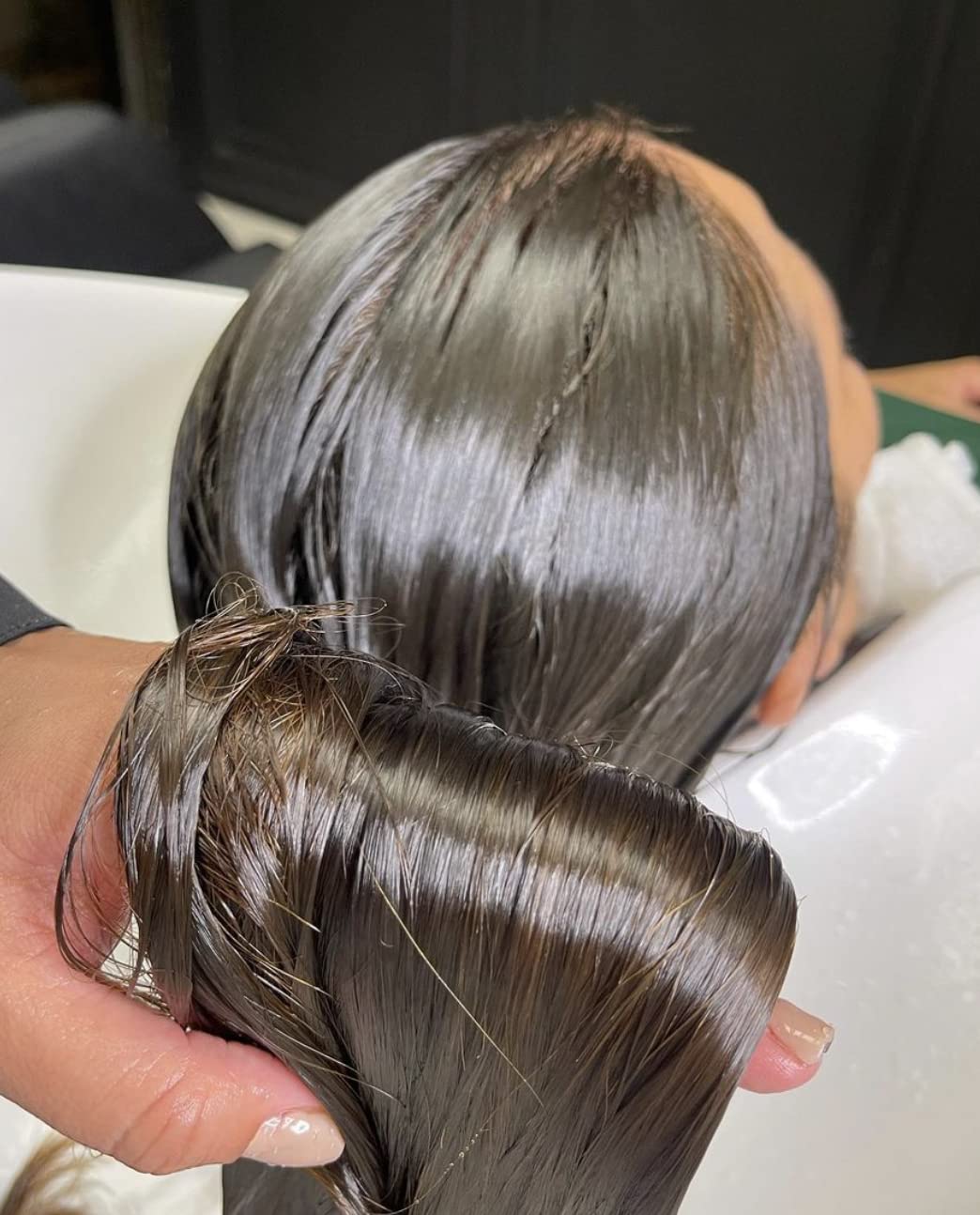 OGC Cosmetics before and after hair split image showing frizz reduction benefit