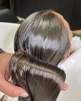 OGC Cosmetics before and after hair split image showing frizz reduction benefit