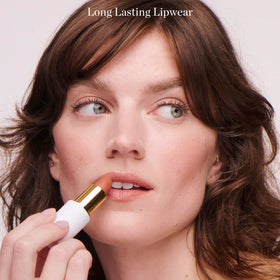 Ogee on-model lips wearing Lulu white pink for flattering everyday color
