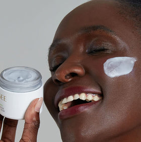 Ogee cream catching sunlight showing radiant finish and skin-brightening benefit