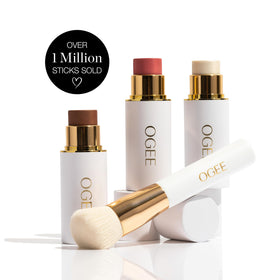 Ogee trio next to travel makeup bag showing on-the-go convenience