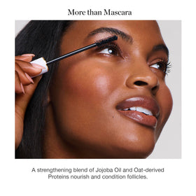 Ogee mascara on bathroom vanity staged for natural morning beauty routine