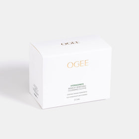 Ogee wipe in hand for size comparison and easy one-step makeup removal