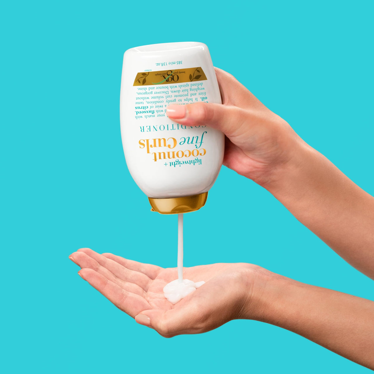 OGX close-up on flaxseed shine emphasizing curl-enhancing benefits