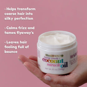 OGX ingredient focus with coconut pieces communicating nourishing oils