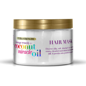 OGX open jar texture close-up highlighting creamy coconut-rich formula