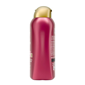 OGX creamy conditioner texture on hand showing smooth formula for easy detangling