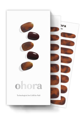 ohora front packaging showing N Pumpkin Swirl brown marble design and kit contents