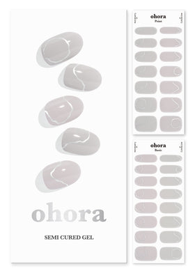 ohora front packaging showing nude metallic strips and included tools for easy setup
