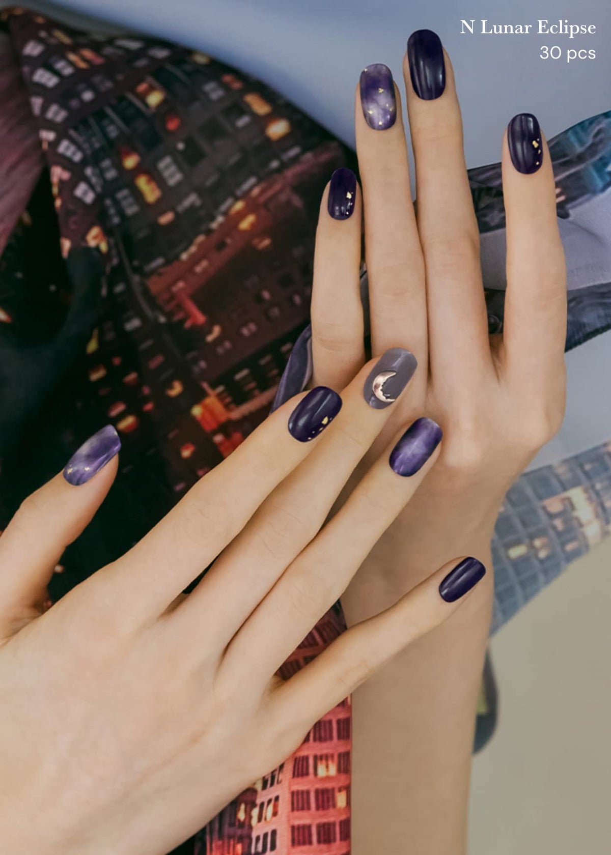 ohora worn on nails lifestyle shot demonstrating N Lunar Eclipse chic long-lasting wear