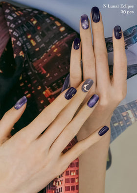 ohora worn on nails lifestyle shot demonstrating N Lunar Eclipse chic long-lasting wear