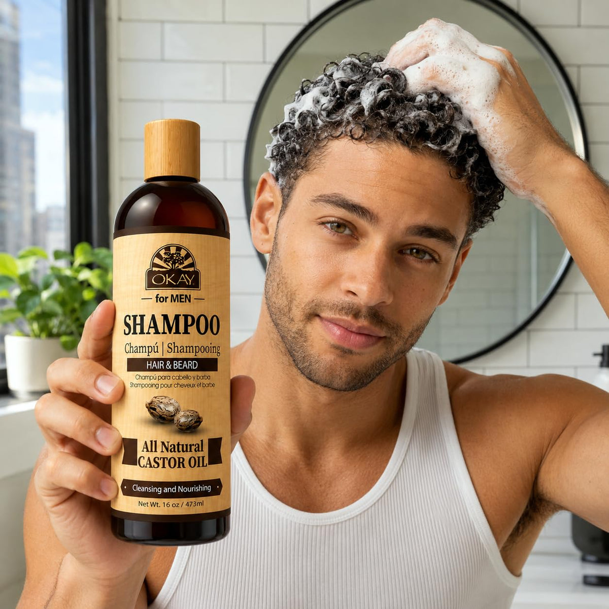 OKAY castor and argan oils spread to show nourishing ingredients and shine