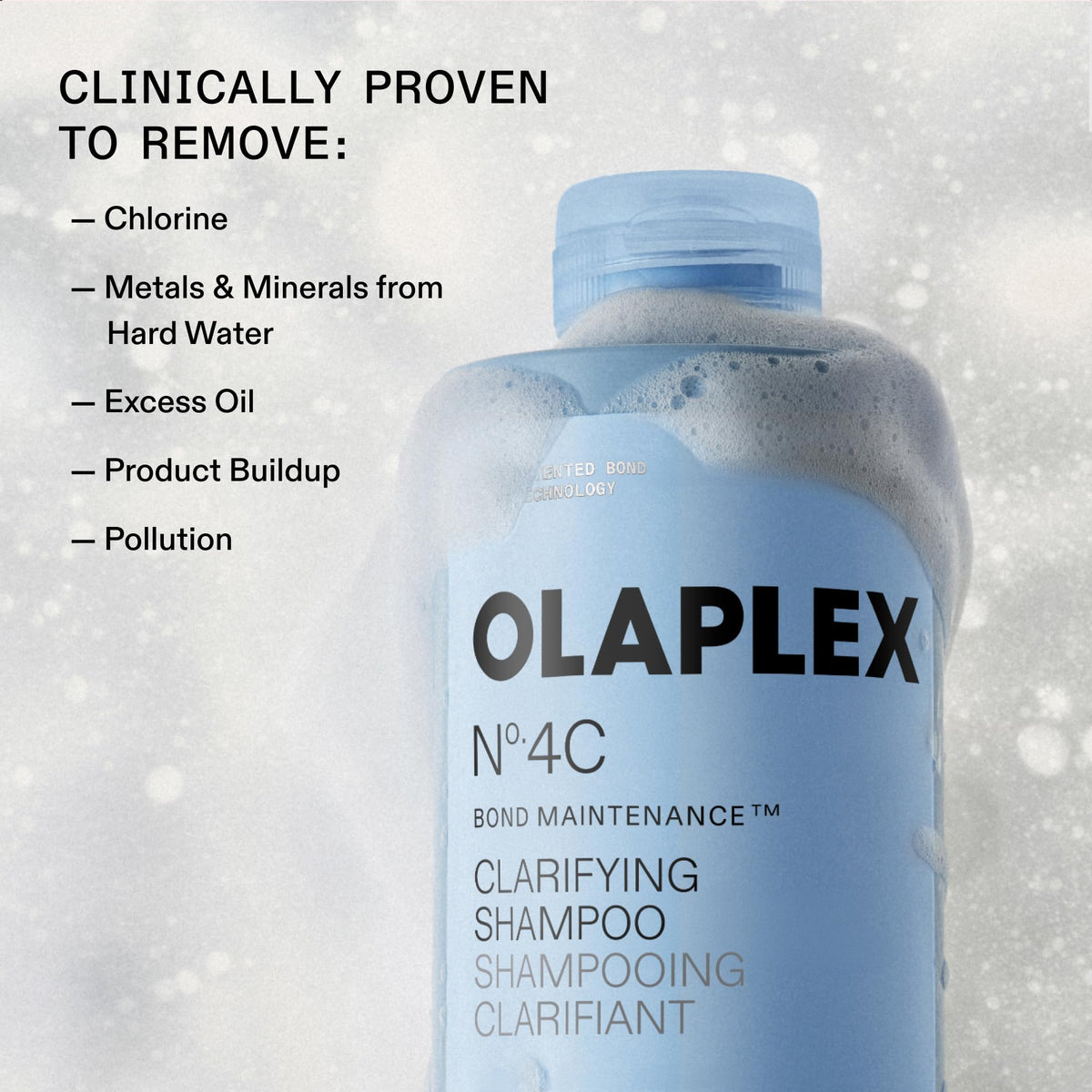 Applying Olaplex Nº.4C directly to scalp to remove buildup and refresh benefit