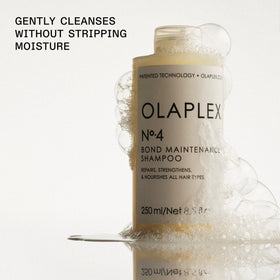 Olaplex Nº.4 in-shower use rinsing through hair showing effective cleansing and slip