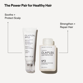 Model applying Olaplex to scalp demonstrating soothing and hydrating benefit