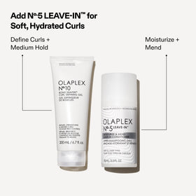 Olaplex Nº.10 applied to damp curls showing detangling benefit