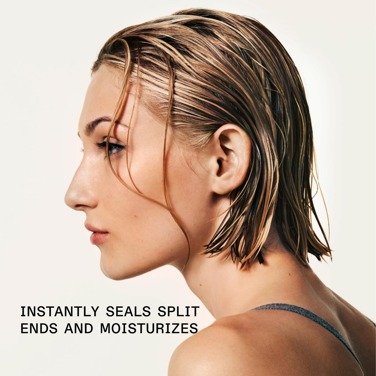 Applying Olaplex Nº.5 on wet hair for detangling and reduced breakage