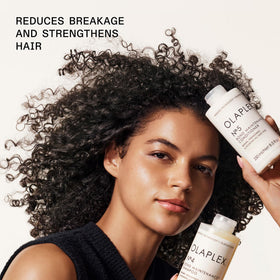 Olaplex pump and cap details highlighting packaging and convenient dispensing benefit