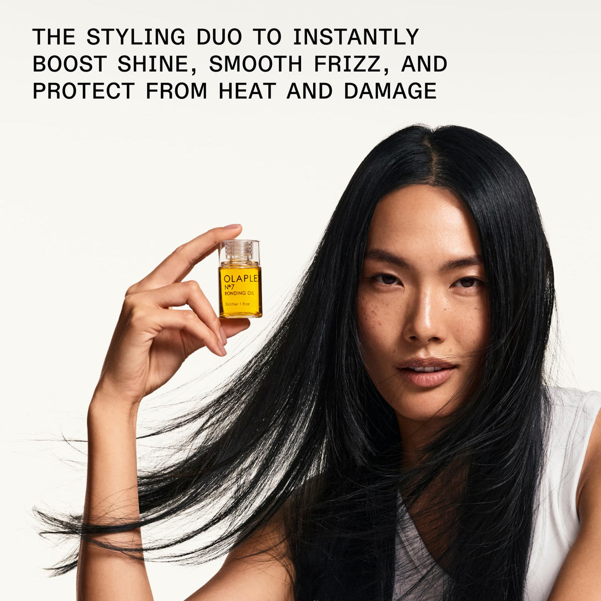 Olaplex No.6 Bond Smoother tube label close-up showing frizz control benefit