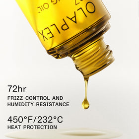 Dispensing action of Olaplex No.7 on fingertips delivering controlled amount and protection