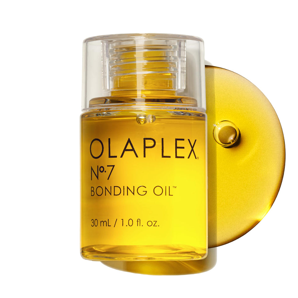 Olaplex No.7 front bottle view highlighting compact 1 fl oz size and brand benefit