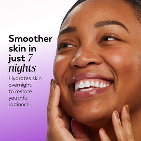 Olay application on hand spreading cream to show non-greasy absorption