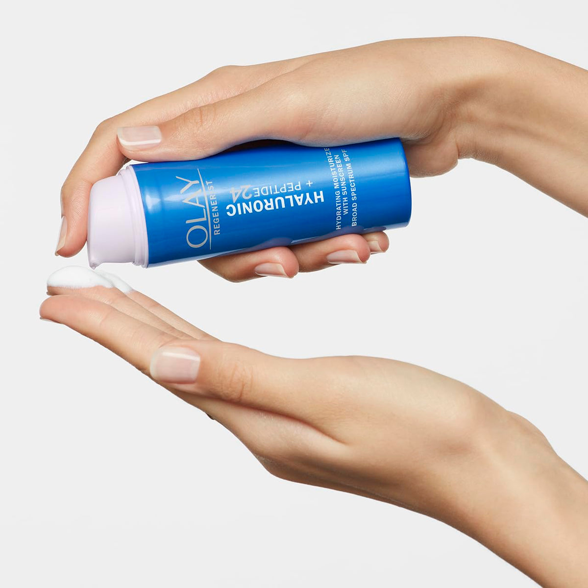 Olay moisturizer applied on hand demonstrating quick absorption