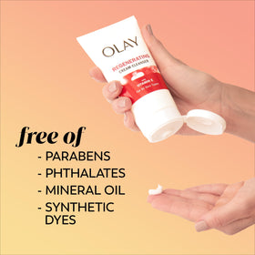 Olay bottle size next to hand for scale and portion clarity