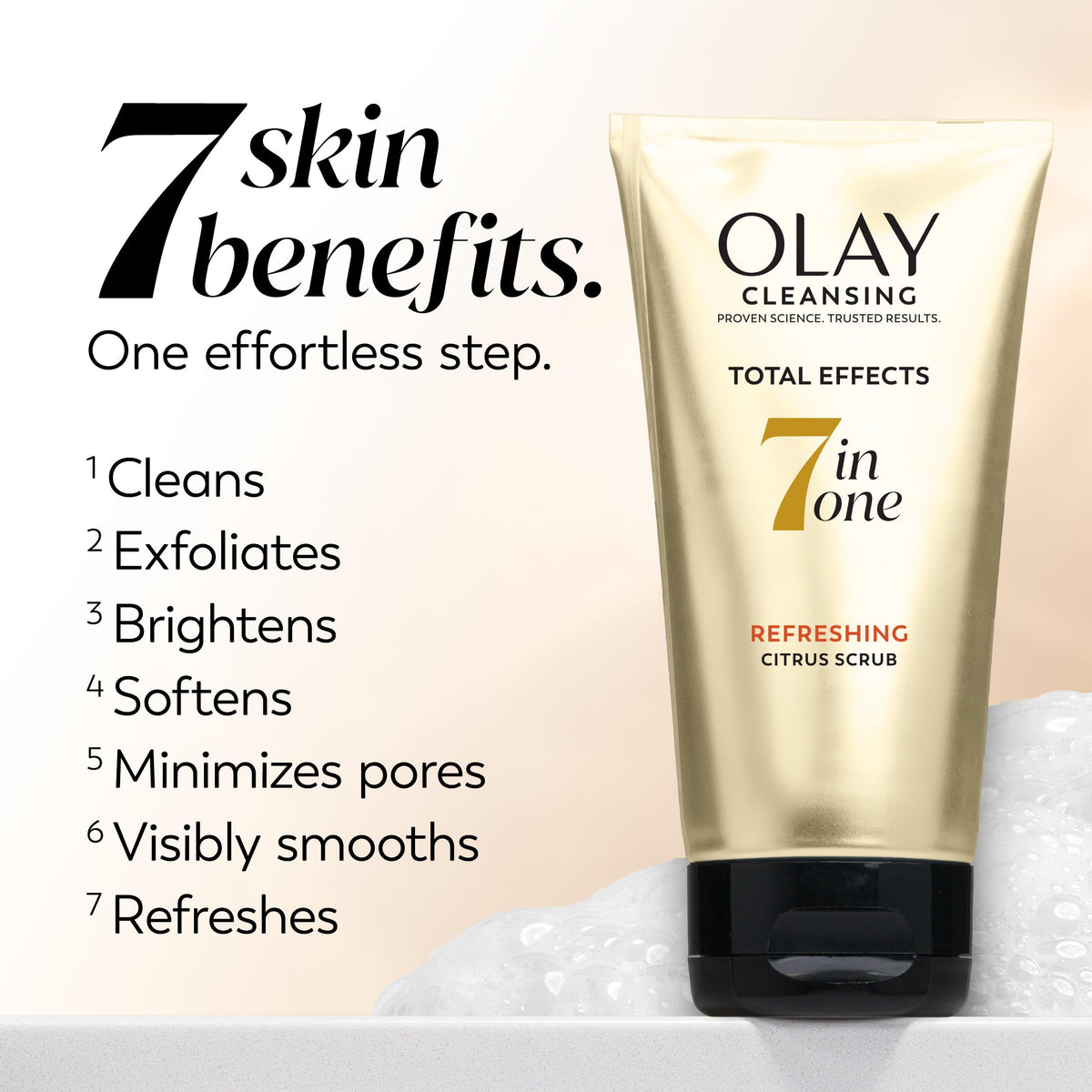 Olay citrus scrub held in hand to show tube size and travel-friendly benefit