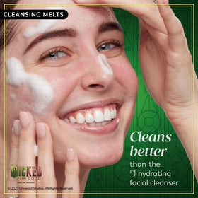 Olay single cleansing pad beside a coin to show size and portability
