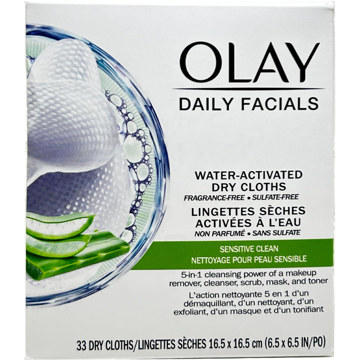 hand holding Olay cloth next to coins to show compact size and portability