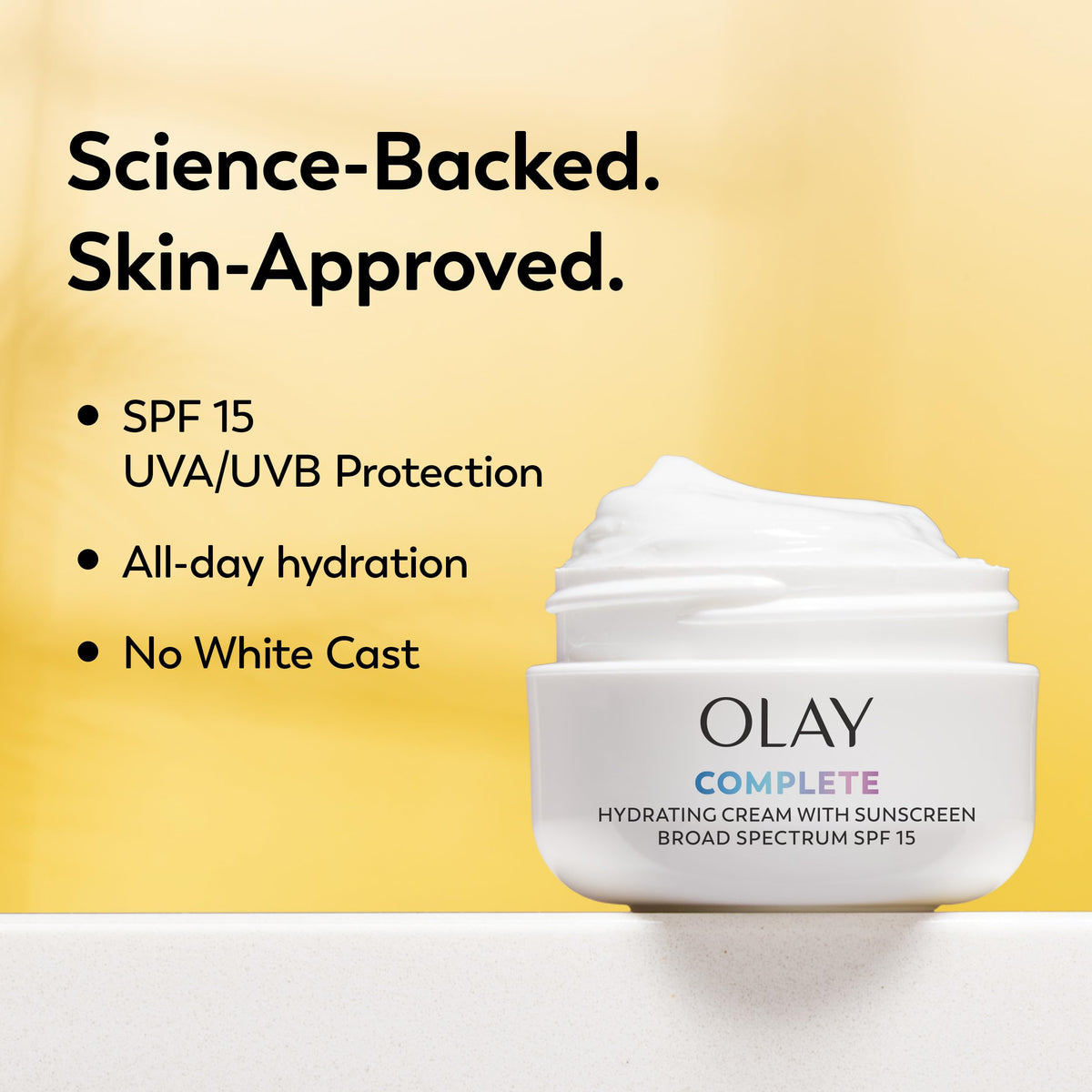 Olay cream dispensed on hand demonstrating non-greasy finish