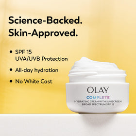 Olay cream dispensed on hand demonstrating non-greasy finish