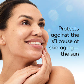 Olay spread on cheek demonstrating quick absorption and non-greasy finish